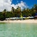 Umbrellas and beach chairs on a stretch of beach on Water Island, United States Virgin Islands